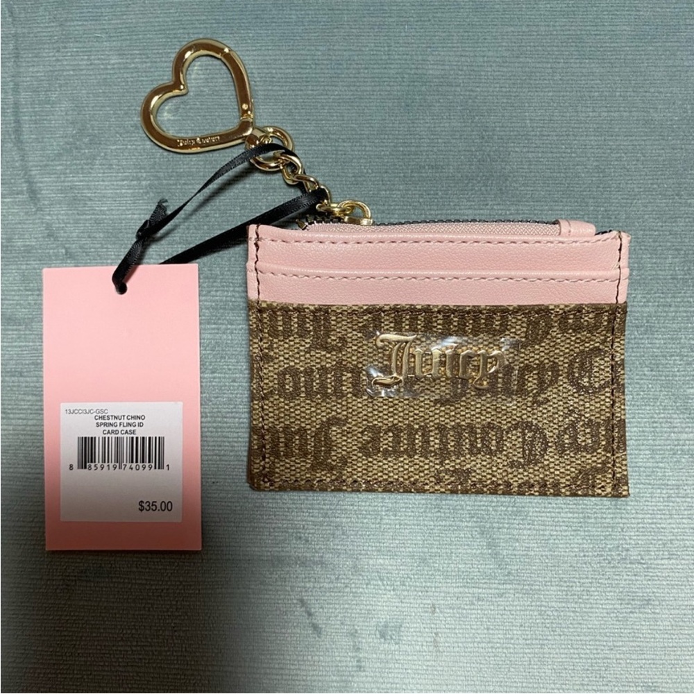NWT…Juicy Couture card case, coin zipper case and heart bag charm. 4 1/2 x 3”.